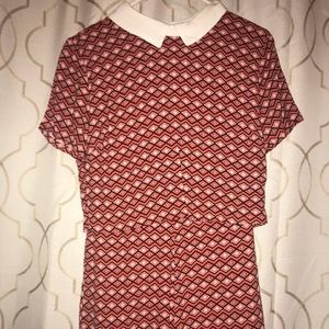 Pink and white and black collared romper.